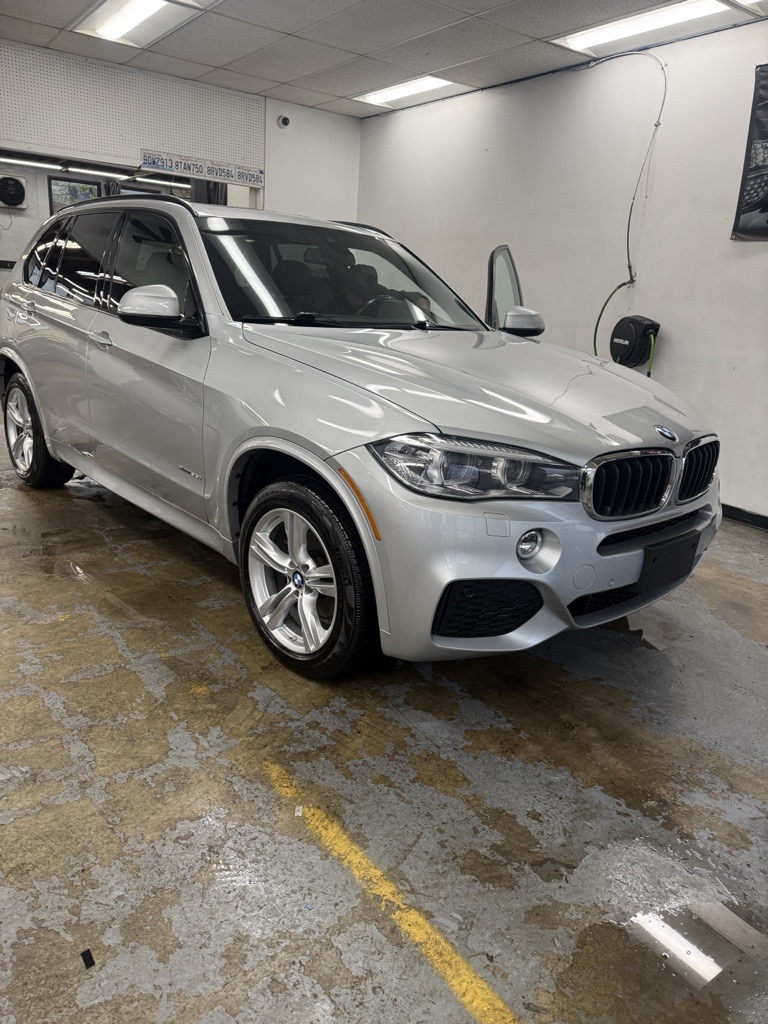 Silver BMW X5 detailed by Ultra Gloss